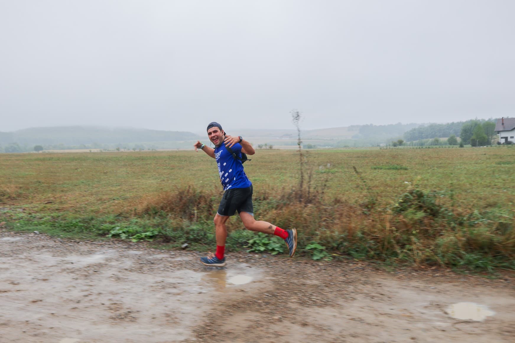Runners Conquer the Muddy Trails of The  Dragormina Marathon, on a Rainy Day