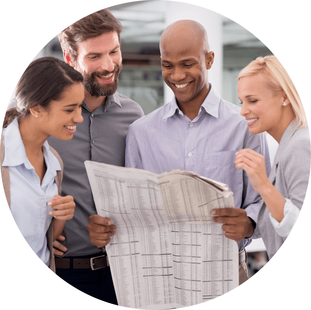 Team of four reading a document