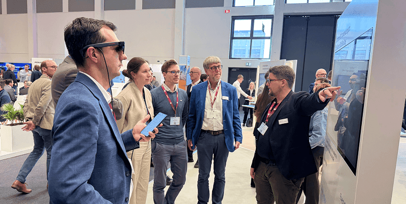 People looking at a demo at DMEA