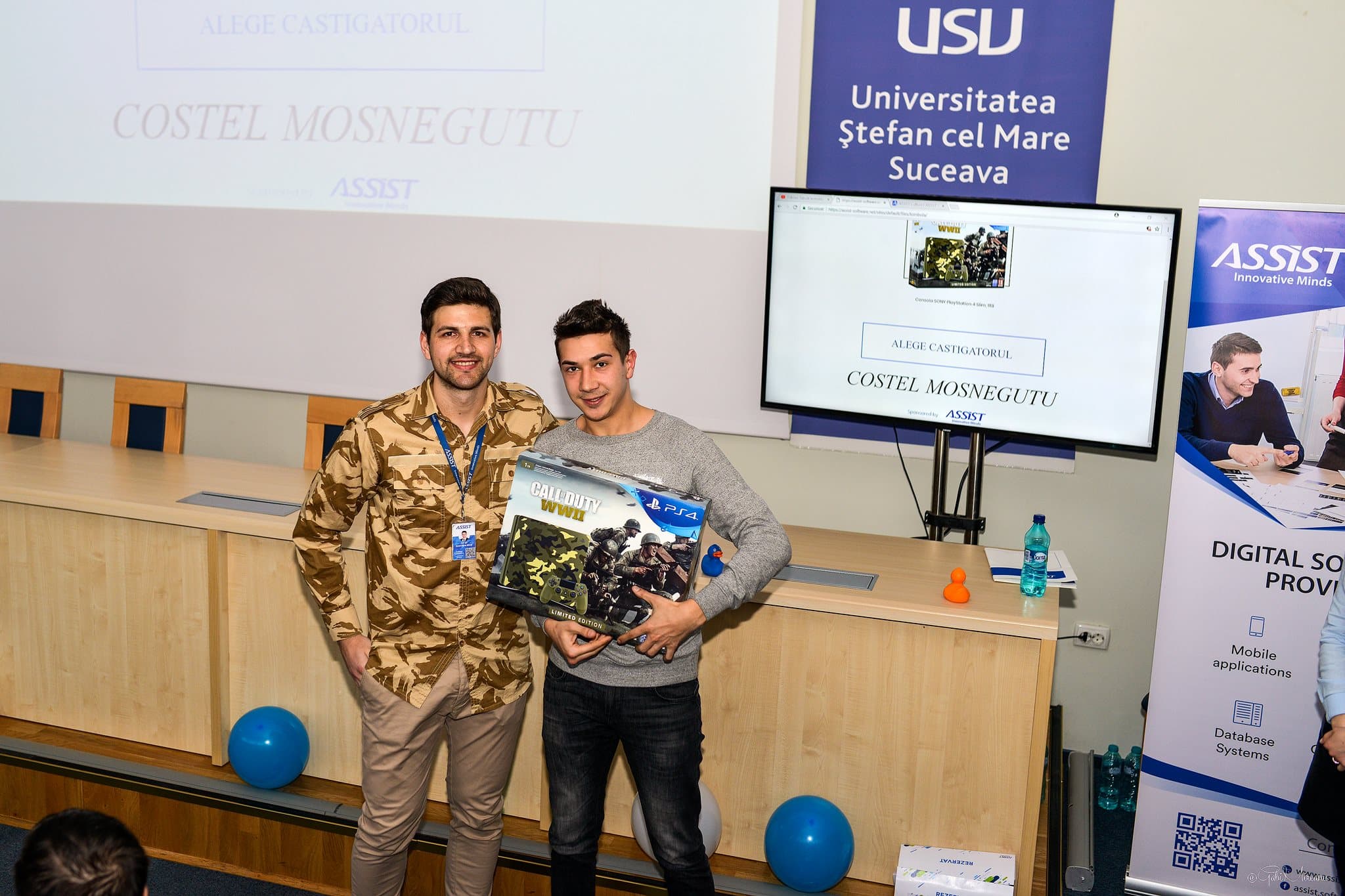 ASSIST Software representative and the prize winner