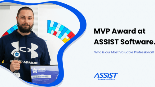 Ionut Holding the MVP award in ASSIST Software